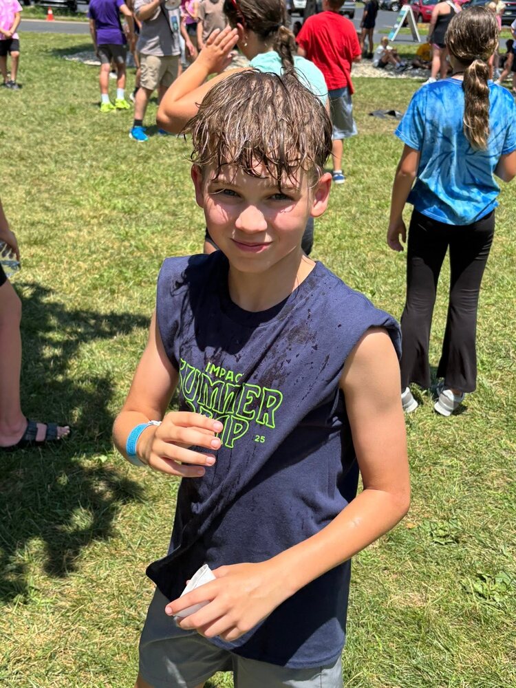A student taking part in an outdoor summer activity